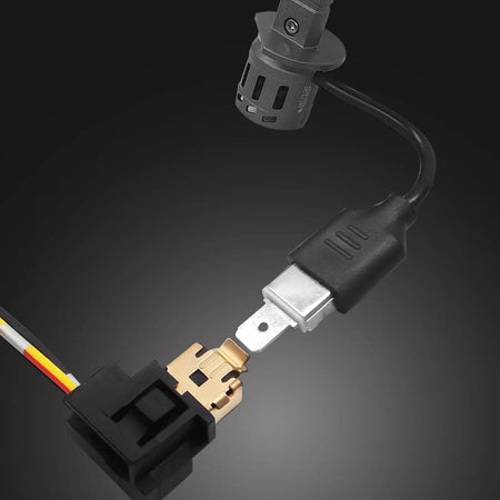 Rimthin E1 H1 LED Headlight Bulb connector, automotive lighting connection. Black, silver, and gold electrical components.